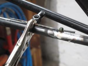 Brake line housing guide being attached